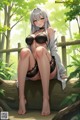 A woman in lingerie sitting on a log in the woods.